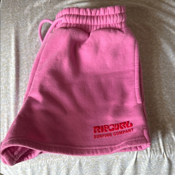 Rip Curl Women's Vibrant Pink Athletic Shorts - Picture 1 of 3